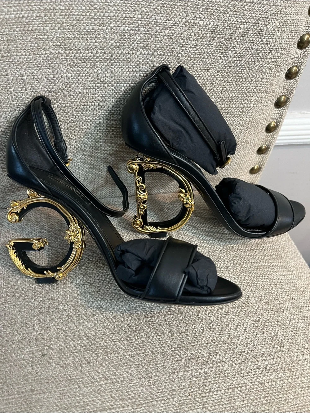 Dolce & Gabbana Black Leather Sandals with Ornate Gold Scroll Heels